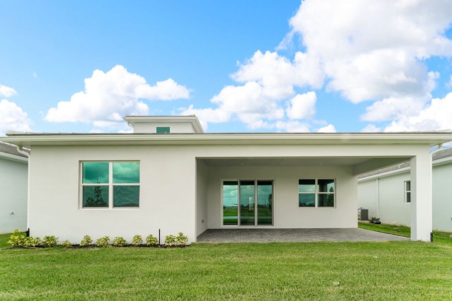 Exterior details and patio area of a home in Tradition, Port St. Lucie (Image 2).