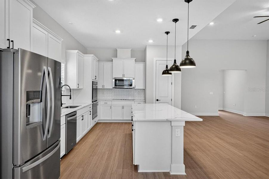 Furnished interior view inside a new home in Stables at Cary Forest, Bryceville (Image 9).