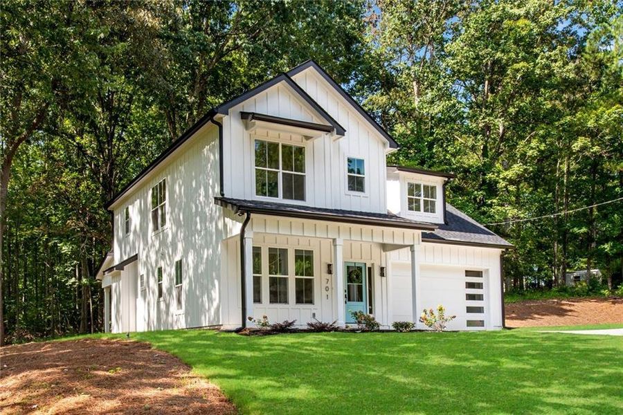 Front exterior of a new home in , Dallas, GA, highlighting curb appeal (Image 30). Front exterior of a new home in , Dallas, GA, highlighting curb appeal (Image 30).