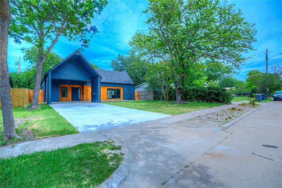 Front exterior of a new home in , Dallas, TX, highlighting curb appeal (Image 15).