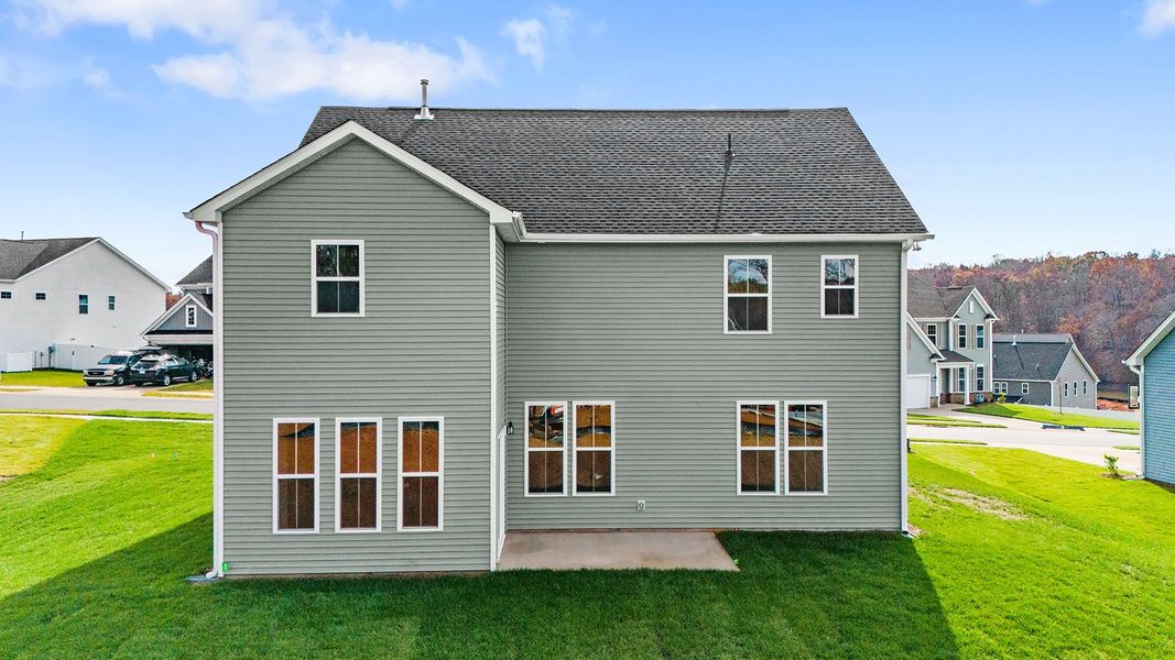 Exterior details and patio area of a home in Hanes Lake, Winston-Salem (Image 24).