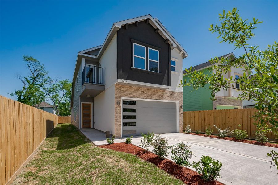 Front exterior of a new home in , Houston, TX, highlighting curb appeal (Image 13).