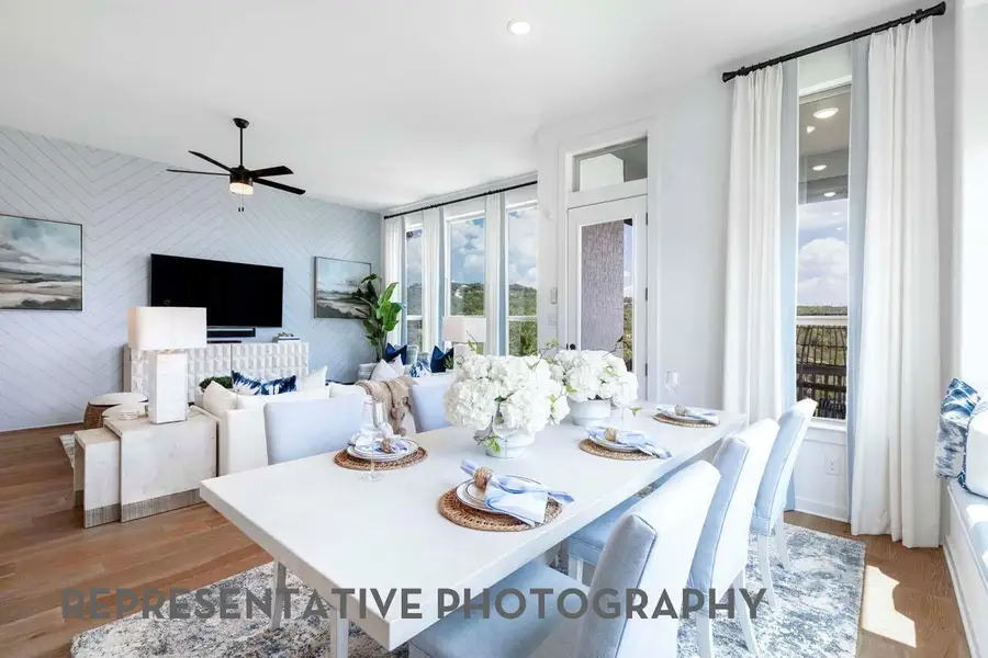 Furnished interior view inside a new home in ARTAVIA, Conroe (Image 27).