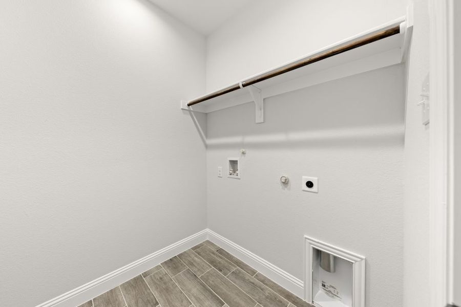 Representative exterior photo of a completed home built from the Kingston by Impression Homes in Arcadia Trails, Balch Springs, TX (Image 27).