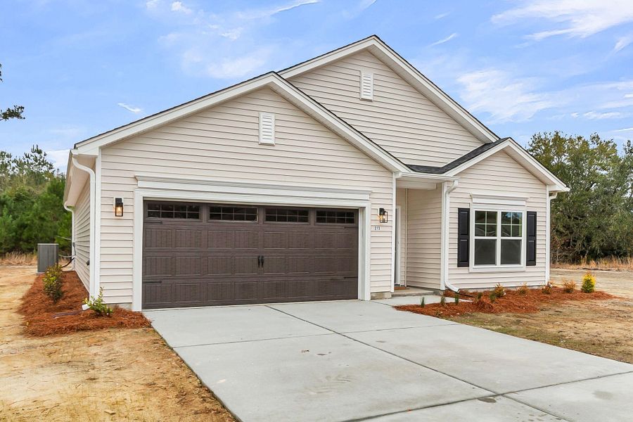 Front exterior of a new home in , Moncks Corner, SC, highlighting curb appeal (Image 24).