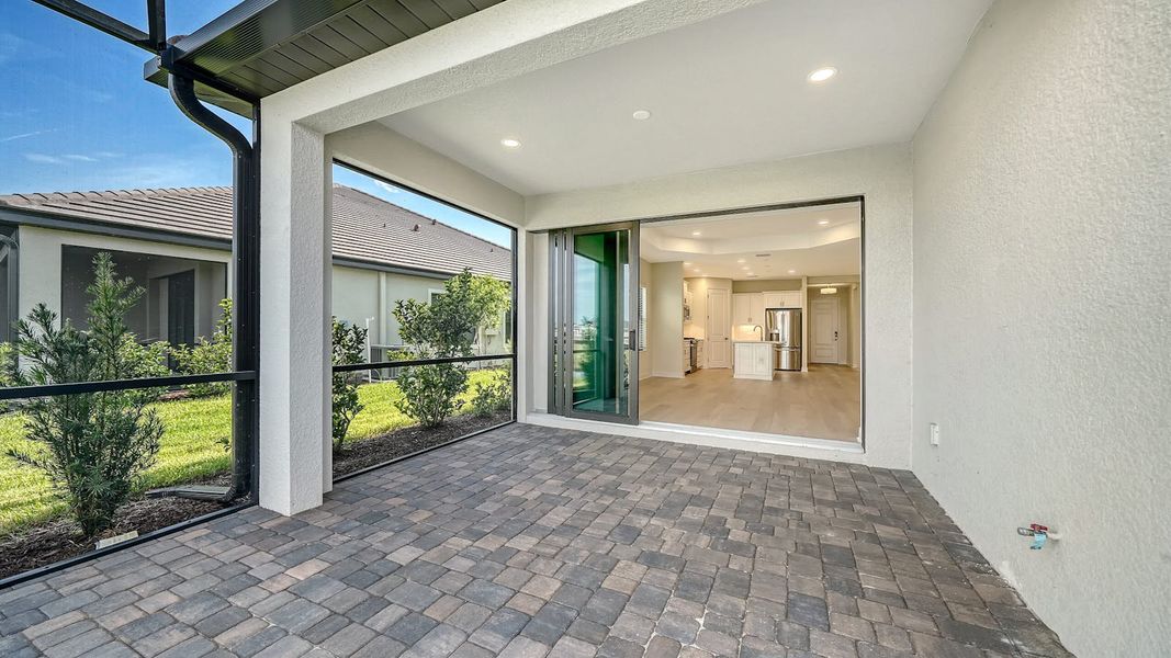 Exterior details and patio area of a home in Vistera of Venice Real Estate and Homes for Sale in Venice, FL - Neal Communities, Nokomis (Image 4).