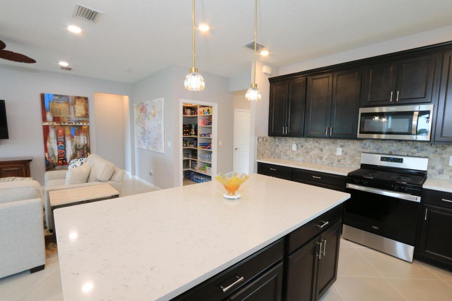 Furnished interior view inside a new home in , Port St. Lucie (Image 6).