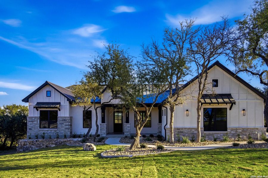 Front exterior of a new home in , New Braunfels, TX, highlighting curb appeal (Image 29).