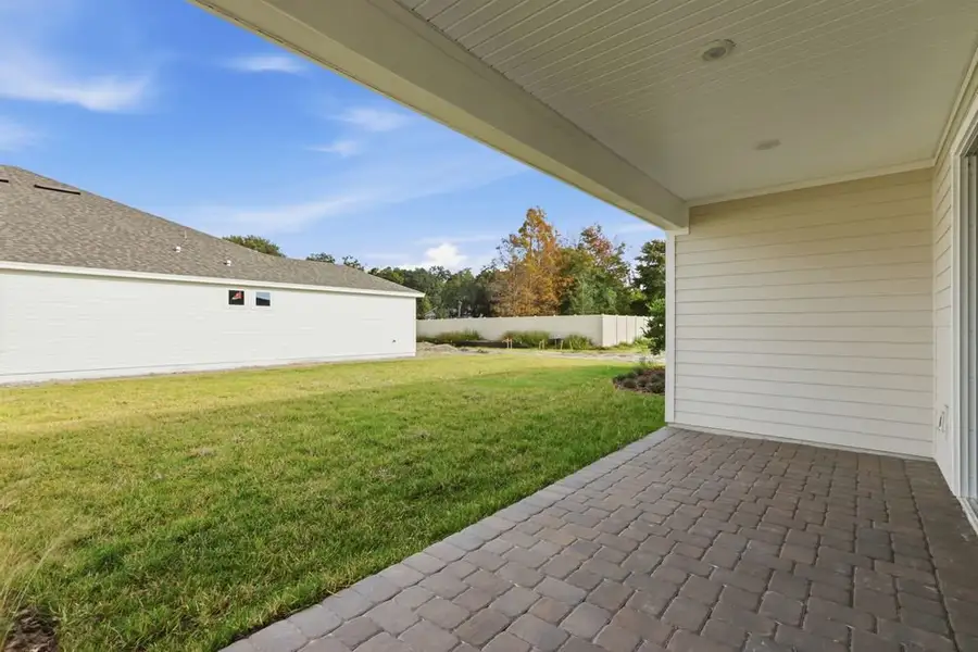 Exterior details and patio area of a home in Headwaters at Lofton Creek, Yulee (Image 3).