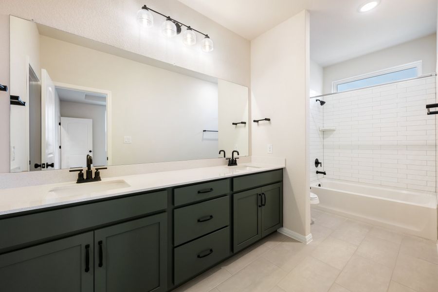 Representative furnished interior of a home built from the Robin by Ashton Woods in The Cottages at Lariat, Liberty Hill (Image 14). Representative furnished interior of a home built from the Robin by Ashton Woods in The Cottages at Lariat, Liberty Hill (Image 14).
