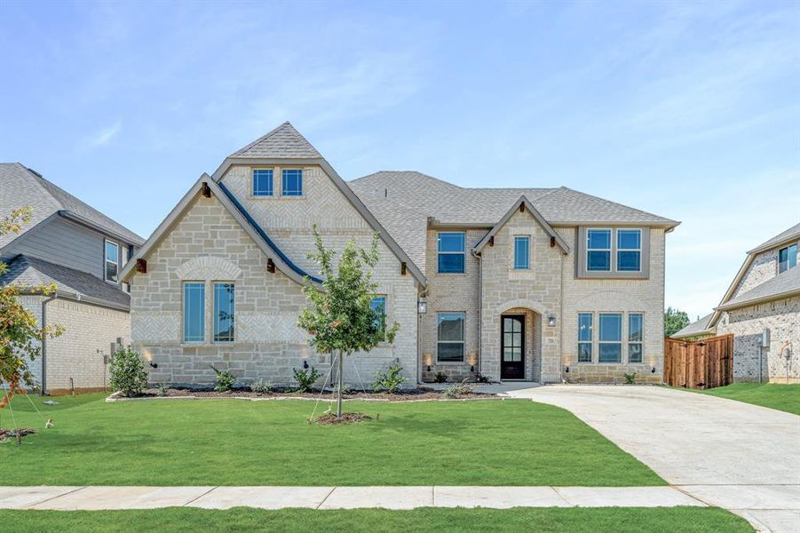 Front exterior of a new home in Mockingbird Hills 60-65, Joshua, TX, highlighting curb appeal (Image 2). Front exterior of a new home in Mockingbird Hills 60-65, Joshua, TX, highlighting curb appeal (Image 2).