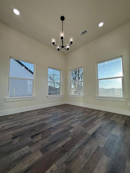 Plenty of lightning and luxury vinyl wood looking flooring.