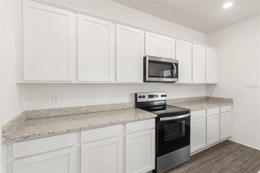 Furnished interior view inside a new home in Peach Crossings, Winter Haven (Image 14).