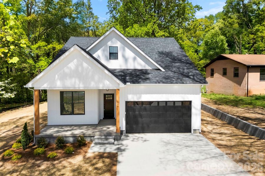 Front exterior of a new home in , Landis, NC, highlighting curb appeal (Image 24).
