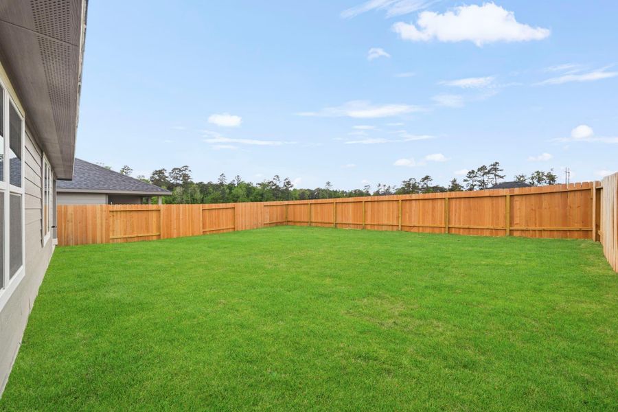 Exterior details and patio area of a home in Chapel Lakes, Montgomery (Image 17).