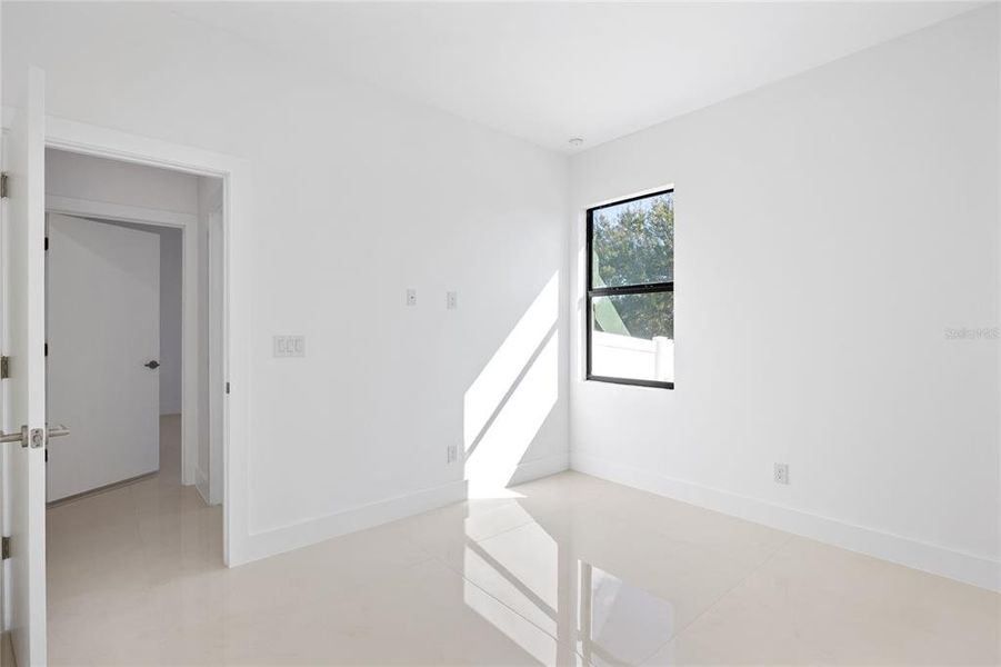 Spacious, unfurnished interior of a new home in , Port Charlotte (Image 24).