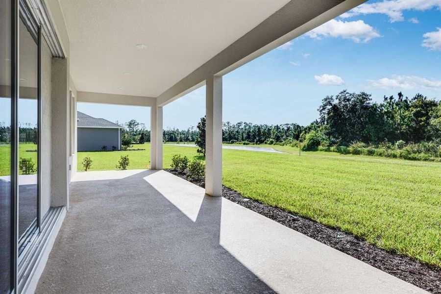 Exterior details and patio area of a home in Ardisia Park, New Smyrna Beach (Image 3).