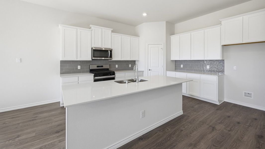 Furnished interior view inside a new home in Fireside by the Lake, Garland (Image 6).
