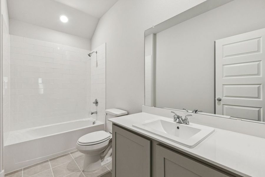 Bathroom in the Oscar home plan by Trophy Signature Homes – REPRESENTATIVE PHOTO Bathroom in the Oscar home plan by Trophy Signature Homes – REPRESENTATIVE PHOTO