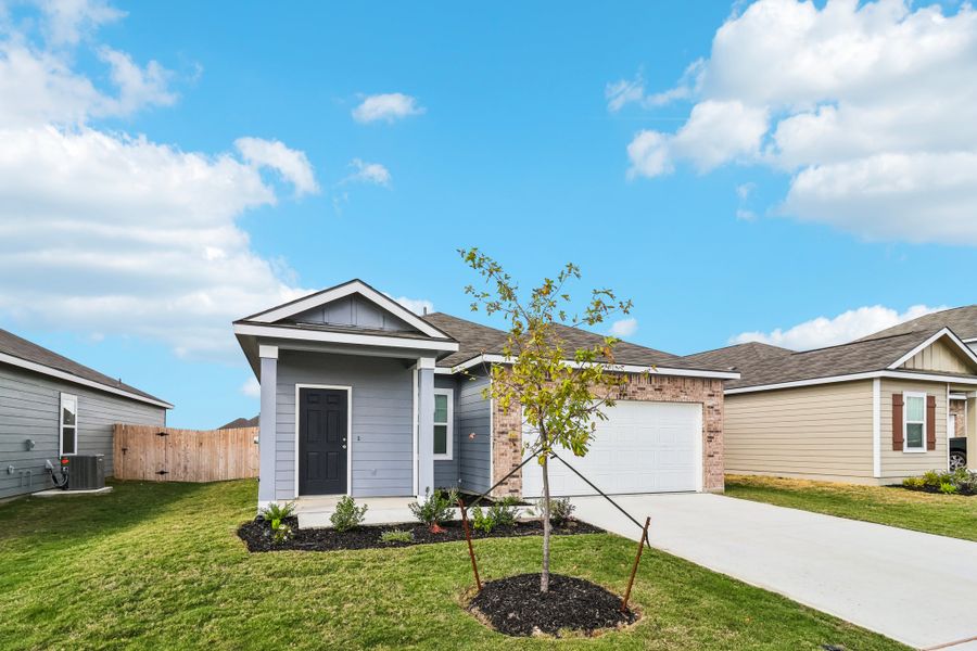 Representative exterior photo of a completed home built from the Sterling by Starlight Homes in Rolling Glen, Hutto, TX (Image 2).