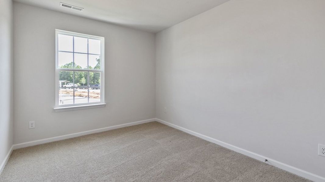 Spacious, unfurnished interior of a new home in The Townes at Wilson's Ridge, Smithfield (Image 22).