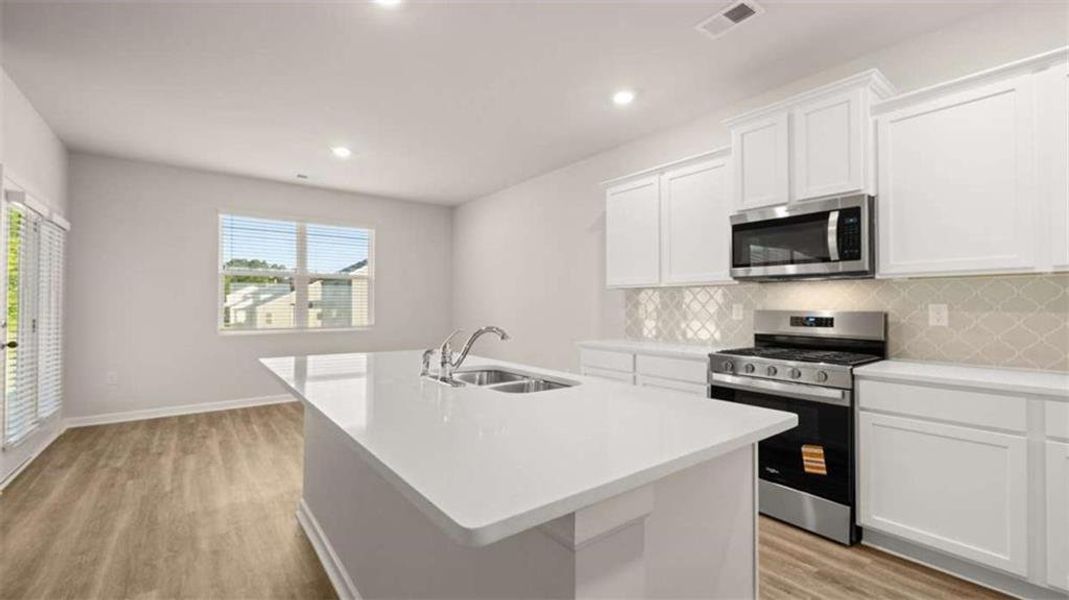 Furnished interior view inside a new home in Preserve at Dove Creek, Statham (Image 9).