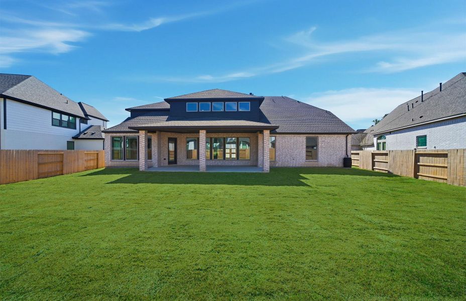 Exterior details and patio area of a home in Artavia 70′, Conroe (Image 23).