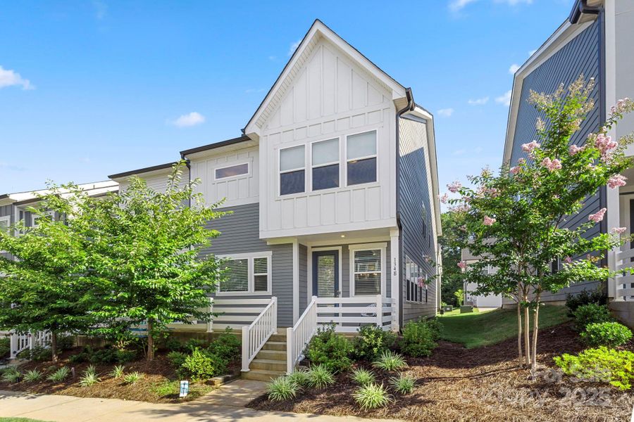 Front exterior of a new home in , Mooresville, NC, highlighting curb appeal (Image 1).