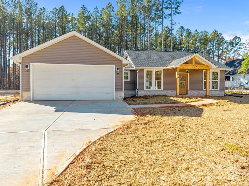 Front exterior of a new home in , Lincolnton, NC, highlighting curb appeal (Image 2). Front exterior of a new home in , Lincolnton, NC, highlighting curb appeal (Image 2).