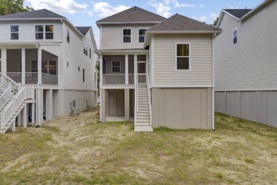 Exterior details and patio area of a home in , Johns Island (Image 30).