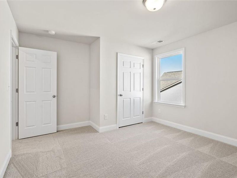 Spacious, unfurnished interior of a new home in Wehunt Meadows, Hoschton (Image 31).
