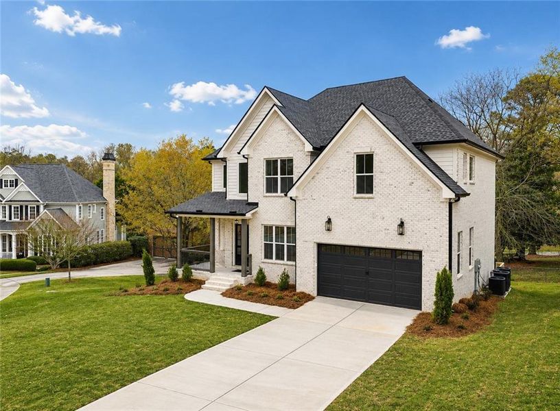 Front exterior of a new home in , Gainesville, GA, highlighting curb appeal (Image 2). Front exterior of a new home in , Gainesville, GA, highlighting curb appeal (Image 2).