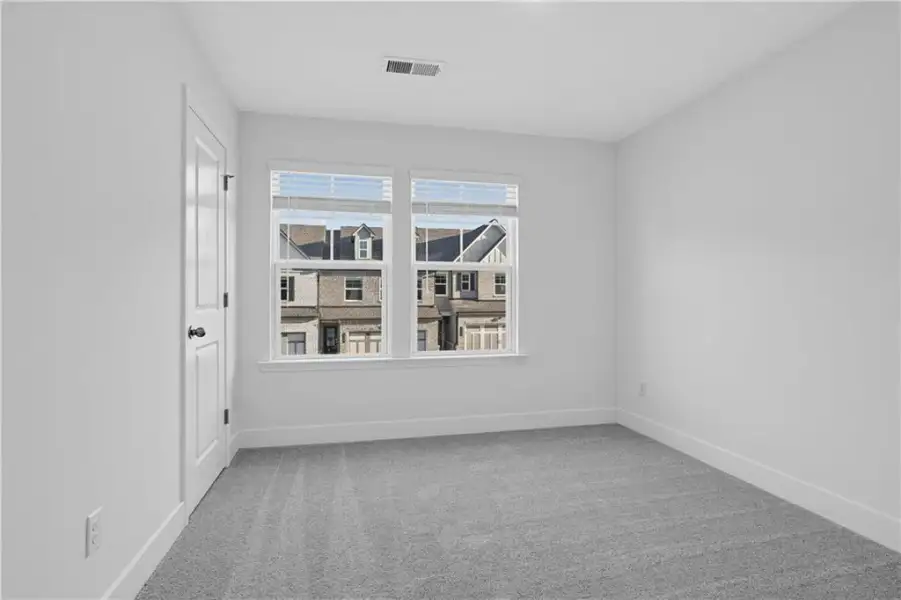 Spacious, unfurnished interior of a new home in Towns at Holly Springs, Holly Springs (Image 26).