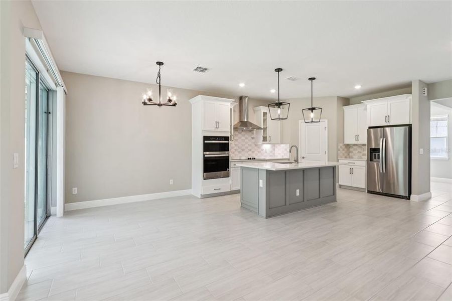 Furnished interior view inside a new home in Legends Preserve - Signature Series, Daytona Beach (Image 5).