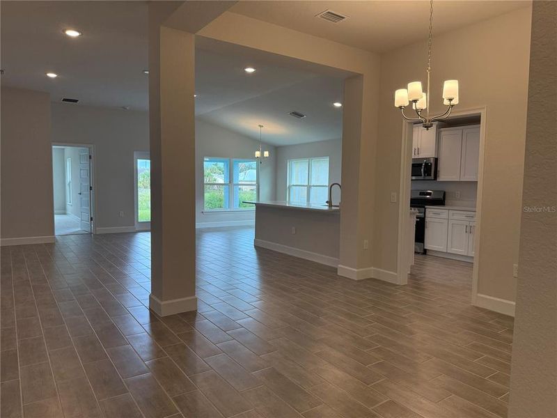 Spacious, unfurnished interior of a new home in Watercress Cove, North Port (Image 7).