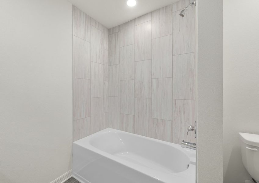 The secondary bathroom includes a shower tub combo.