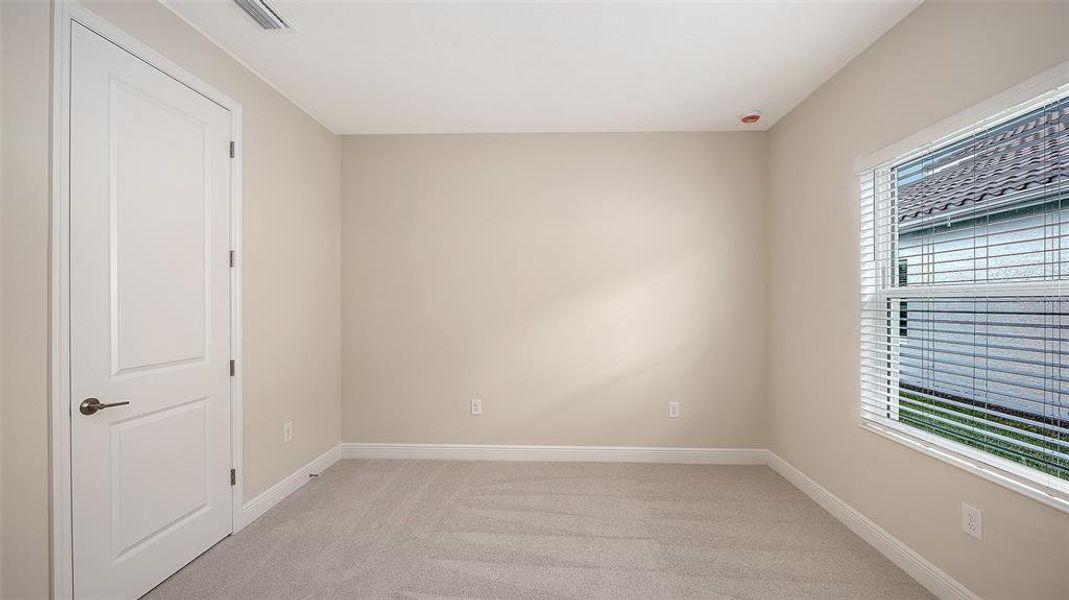 Spacious, unfurnished interior of a new home in Grand Park, Sarasota (Image 34).
