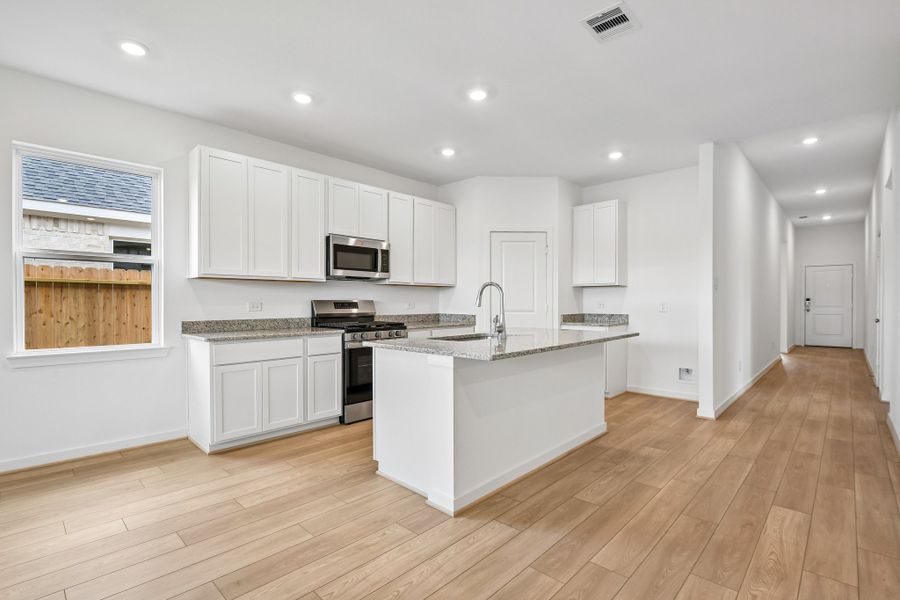 Furnished interior view inside a new home in Raburn Reserve 50s, Tomball (Image 7).