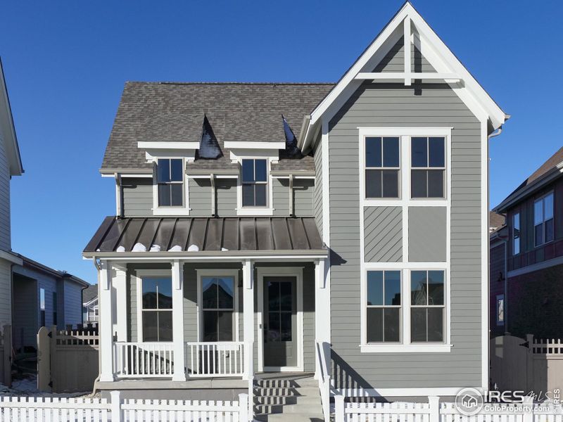 Front exterior of a new home in Westerly, Erie, CO, highlighting curb appeal (Image 2). Front exterior of a new home in Westerly, Erie, CO, highlighting curb appeal (Image 2).