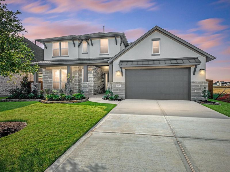 Front exterior of a new home in Dunham Pointe 60′, Cypress, TX, highlighting curb appeal (Image 2).