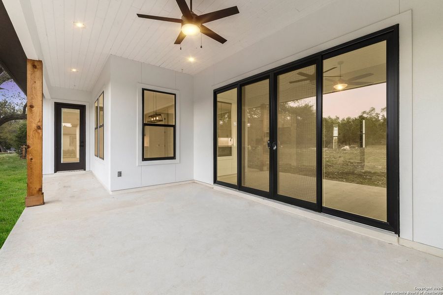 Exterior details and patio area of a home in , Spring Branch (Image 22).