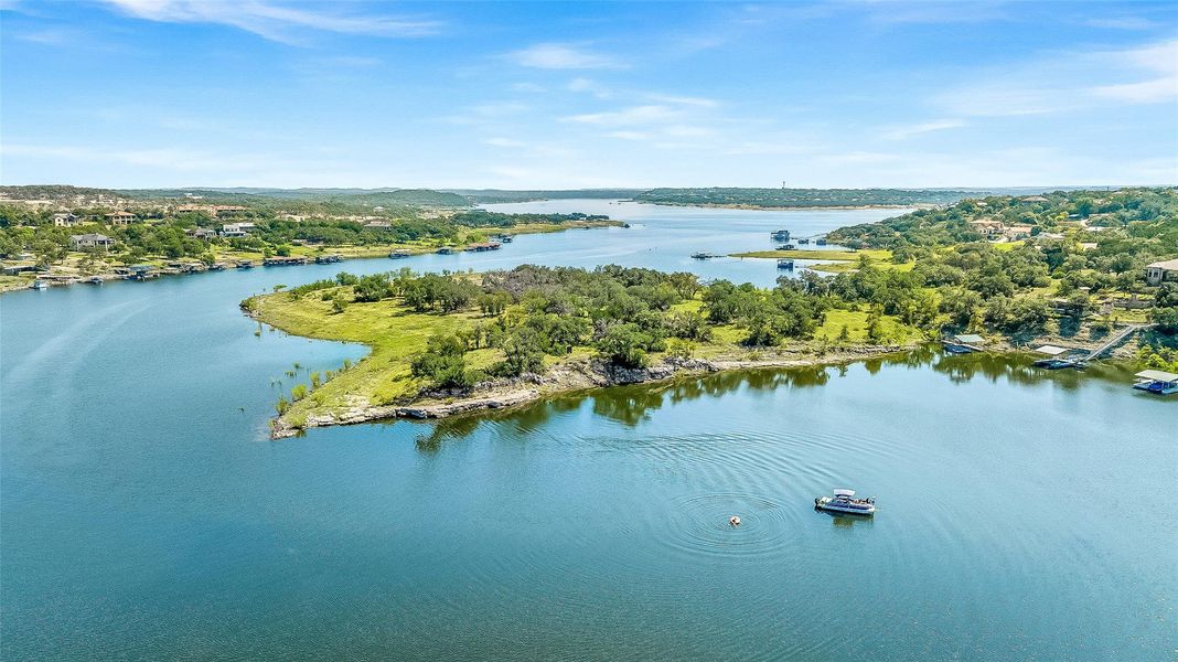 This property enjoys a uniquely private harbor with deep, year-round water ranging from 35 to 80 feet—ideal for boating, swimming, paddle boarding, and tranquil lakeside living.