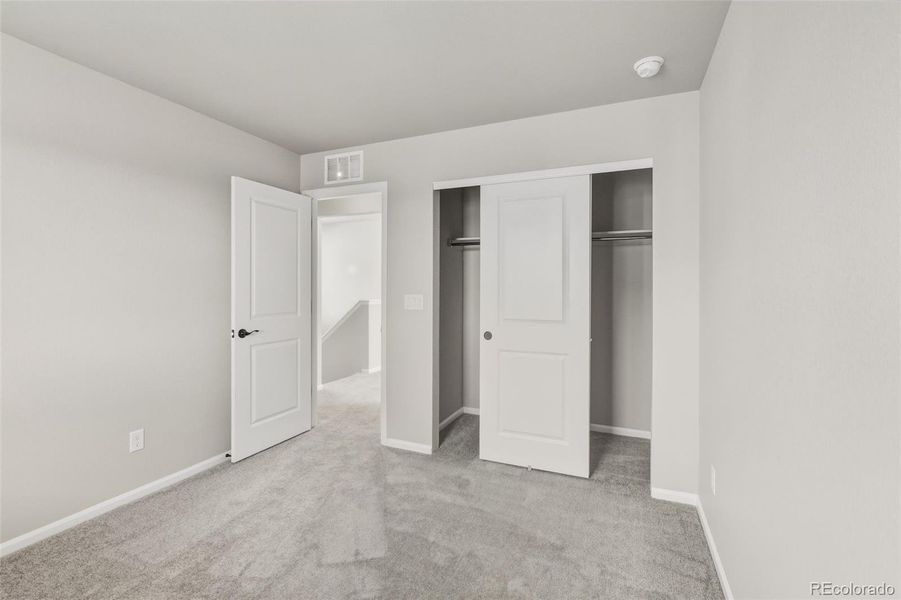 Spacious, unfurnished interior of a new home in Woodrose at Painted Prairie, Aurora (Image 19).