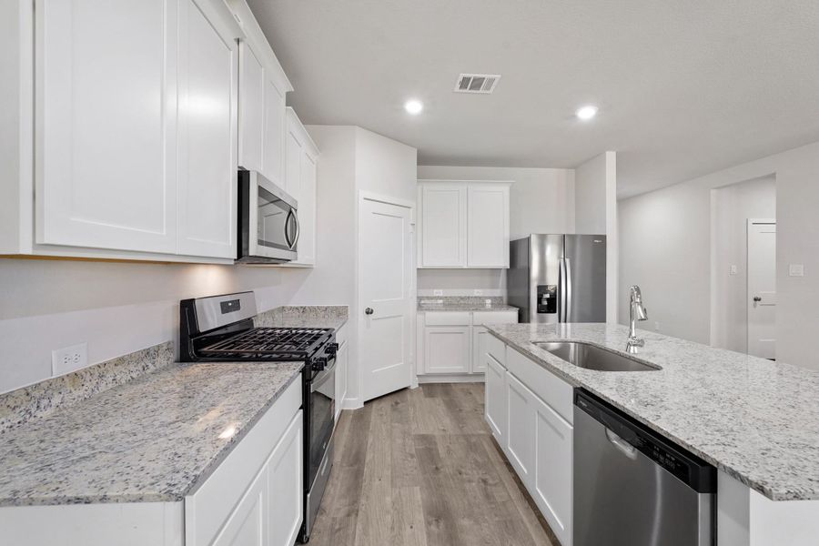 Furnished interior view inside a new home in Lexington Heights, Willis (Image 9).