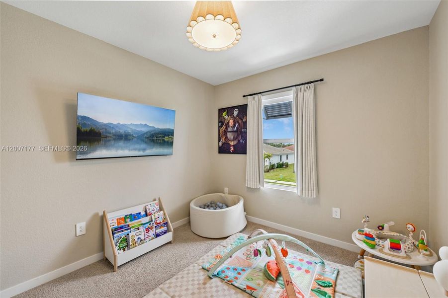 Furnished interior view inside a new home in Messina Place, Homestead (Image 19).
