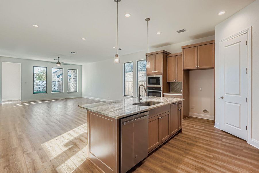Furnished interior view inside a new home in 6 Creeks, Kyle (Image 4).
