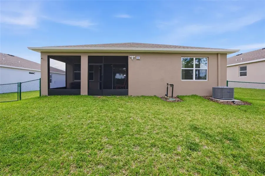Exterior details and patio area of a home in JB Ranch, Ocala (Image 26).