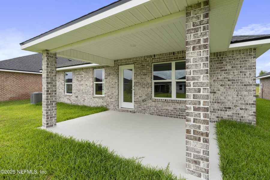 Front exterior of a new home in Shadow Crest at Rolling Hills, Green Cove Springs, FL, highlighting curb appeal (Image 14).