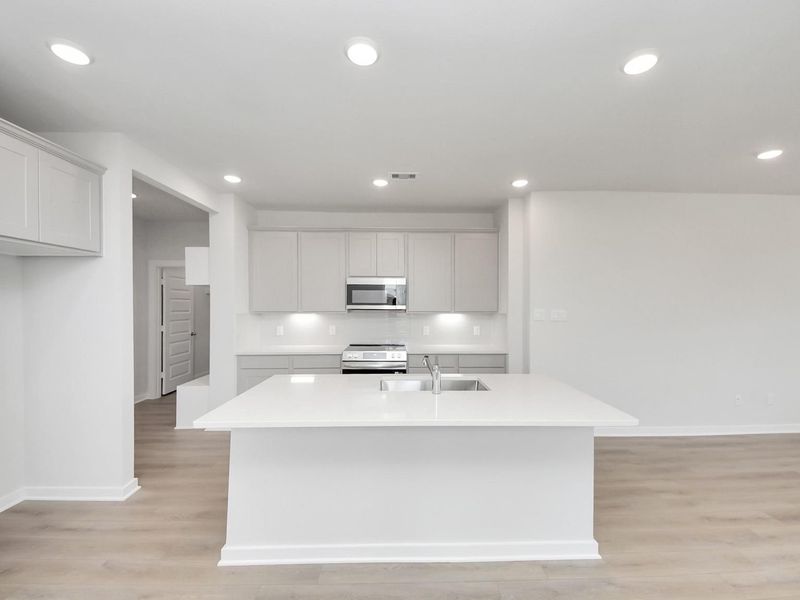 Furnished interior view inside a new home in Spring Branch Crossing, Conroe (Image 5).