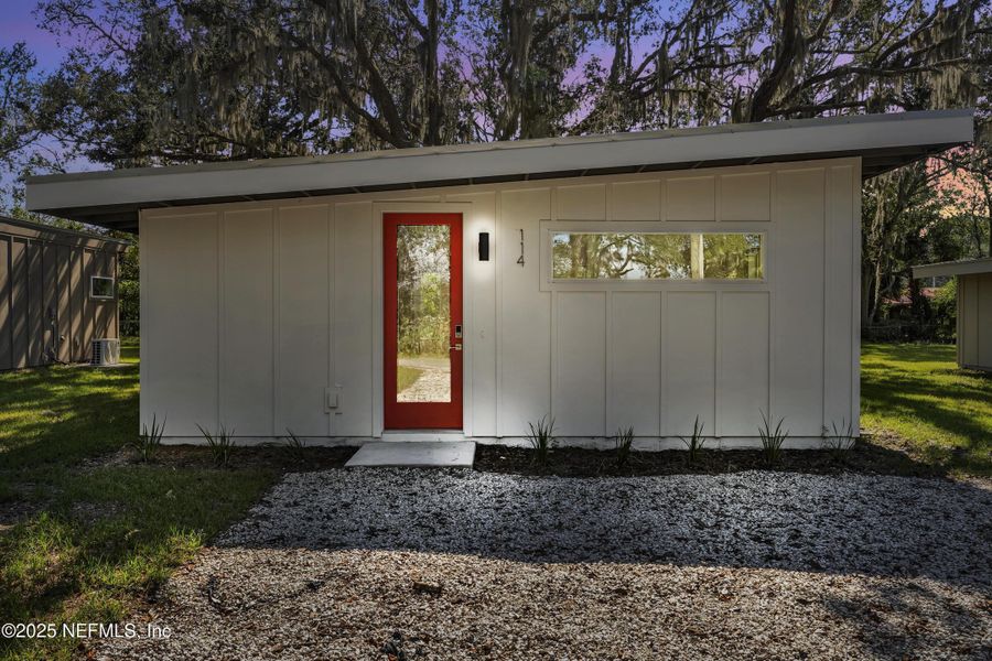 Front exterior of a new home in , Hastings, FL, highlighting curb appeal (Image 14).